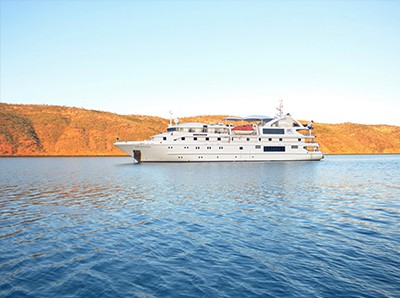 Small boat Coral Discoverer sails the Kimberley